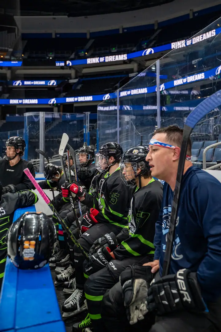 Players watching the action from the bench