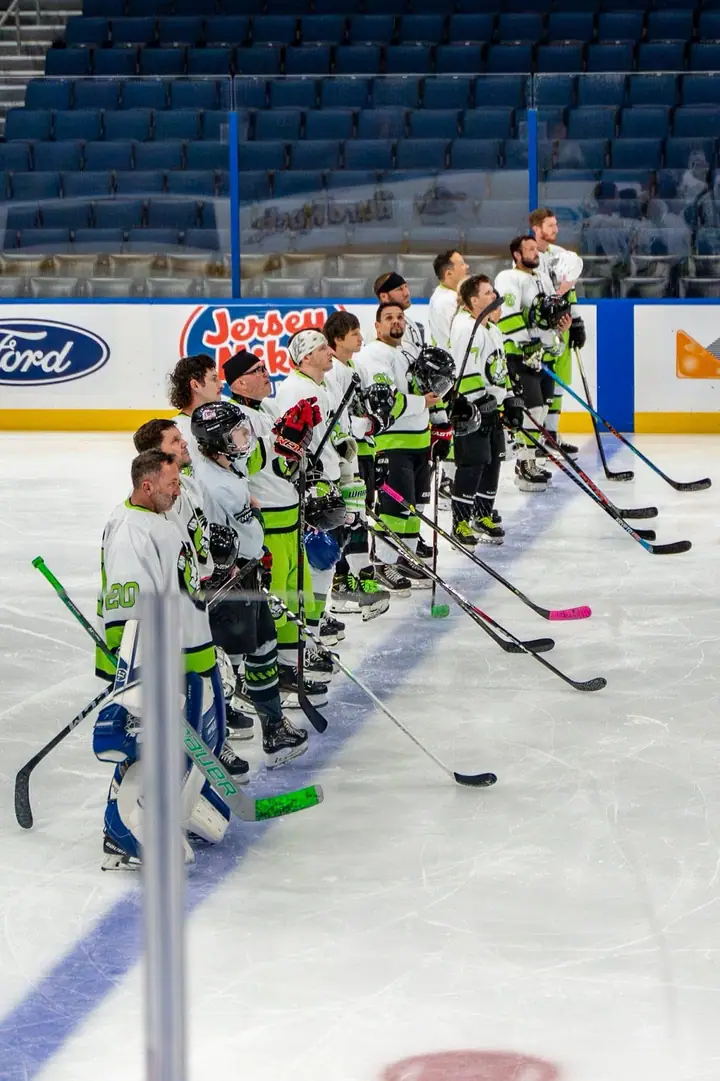 Both teams lined up along the blue line before puck drop